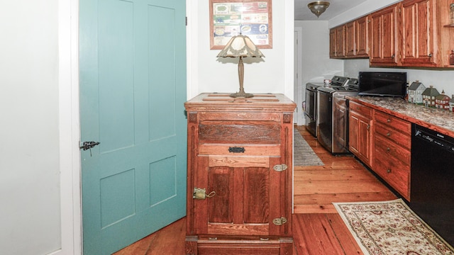 133 Hio Ridge Rd, Bridgton, ME 04009 - kitchen with independent washer and dryer, dishwasher, and light wood-style flooring