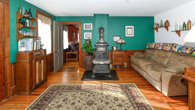133 Hio Ridge Rd, Bridgton, ME 04009 - living area featuring wood finished floors and a wood stove