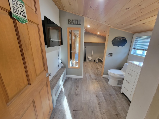 67 Stevens St, Lewiston, ME 04240 - bathroom with wood ceiling, wood finished floors, lofted ceiling, vanity, and recessed lighting