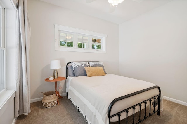 65 Wildbrook Ln, Eliot, ME 03903 - carpeted bedroom with baseboards and ceiling fan