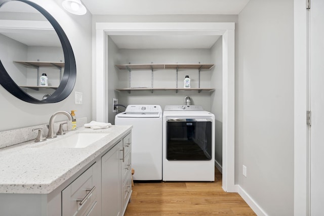 65 Wildbrook Ln, Eliot, ME 03903 - laundry area featuring washing machine and clothes dryer and light wood-style floors