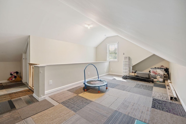 65 Wildbrook Ln, Eliot, ME 03903 - additional living space featuring carpet flooring and vaulted ceiling