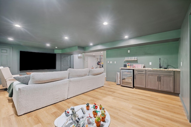 65 Wildbrook Ln, Eliot, ME 03903 - living area featuring wine cooler, wet bar, light wood-style flooring, and recessed lighting