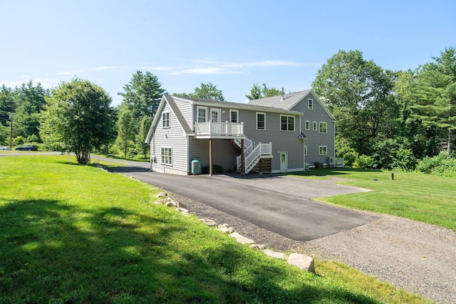 65 Wildbrook Ln, Eliot, ME 03903 - view of front facade with stairway and a front yard