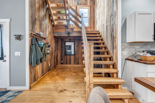 17 Applehead Way, Orrington, ME 04474 - stairs featuring wood walls and wood-type flooring
