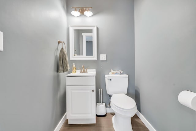 17 Applehead Way, Orrington, ME 04474 - half bathroom featuring vanity and wood finished floors