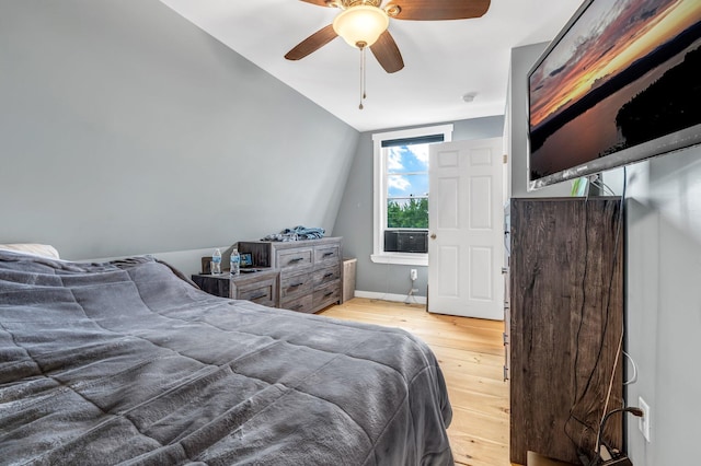 17 Applehead Way, Orrington, ME 04474 - bedroom with light wood-type flooring, vaulted ceiling, and a ceiling fan