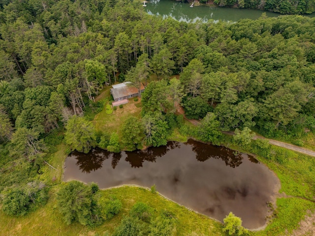 aerial view of property and surrounding area featuring a large body of water