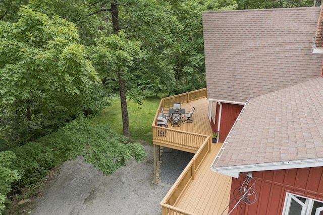 2288 W River Rd, Sidney, ME 04330 - exterior view of board and batten siding, roof with shingles, gutters, and a downspout