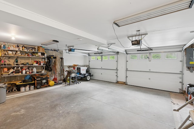 2288 W River Rd, Sidney, ME 04330 - garage featuring a garage door opener