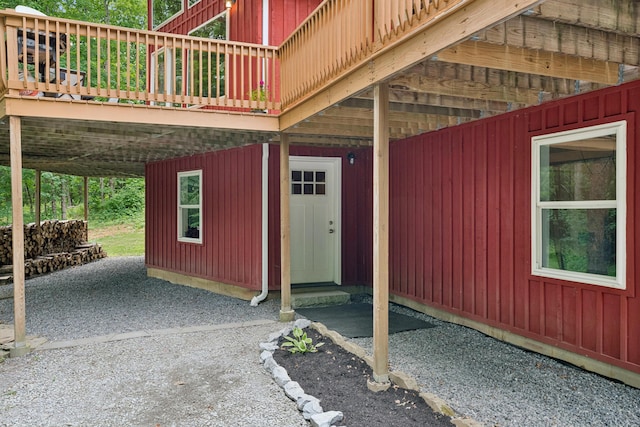 2288 W River Rd, Sidney, ME 04330 - entrance to property with a deck and board and batten siding