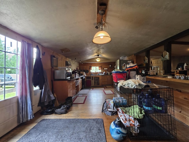 17 Cross St, Kingman Twp, ME 04451 - living room featuring wood finished floors, ceiling fan, and a textured ceiling