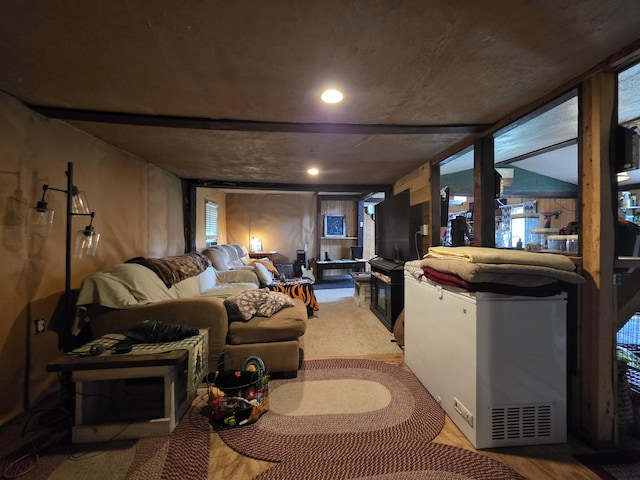 17 Cross St, Kingman Twp, ME 04451 - living room featuring plenty of natural light, wood finished floors, and recessed lighting
