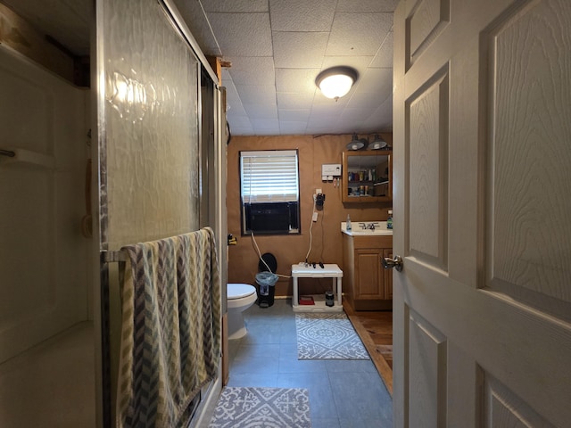 17 Cross St, Kingman Twp, ME 04451 - bathroom featuring vanity, a stall shower, and tile patterned flooring