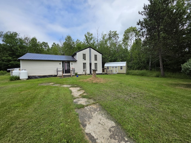 17 Cross St, Kingman Twp, ME 04451 - view of green lawn with an outdoor structure