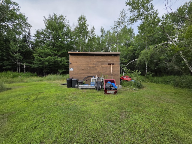 17 Cross St, Kingman Twp, ME 04451 - view of grassy yard featuring an outbuilding