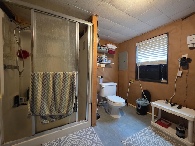 17 Cross St, Kingman Twp, ME 04451 - full bath with a shower stall, electric panel, cooling unit, and tile patterned floors