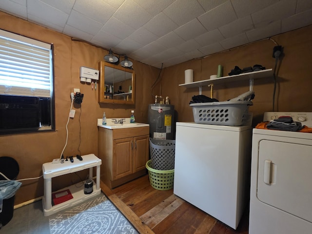 17 Cross St, Kingman Twp, ME 04451 - laundry room featuring cabinet space, washer and dryer, electric water heater, wood finished floors, and cooling unit