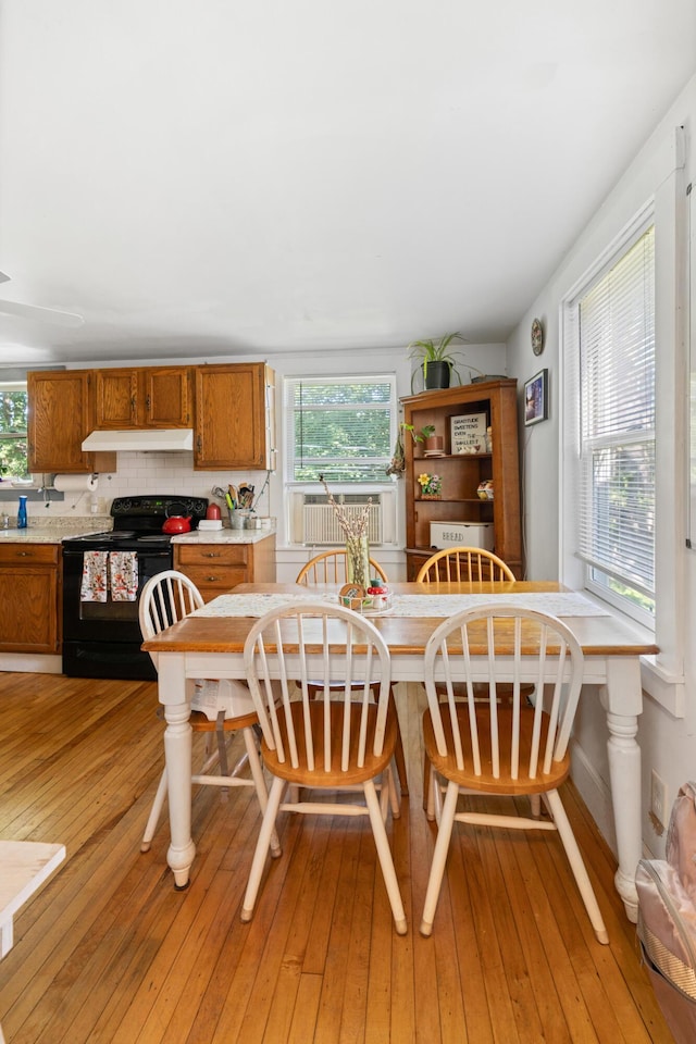 46 Meadow Way, Bath, ME 04530 - dining space with light wood finished floors and cooling unit