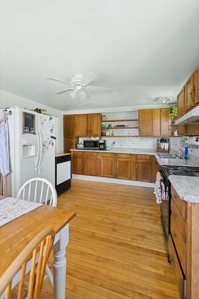 46 Meadow Way, Bath, ME 04530 - kitchen featuring white appliances, open shelves, brown cabinetry, and ceiling fan