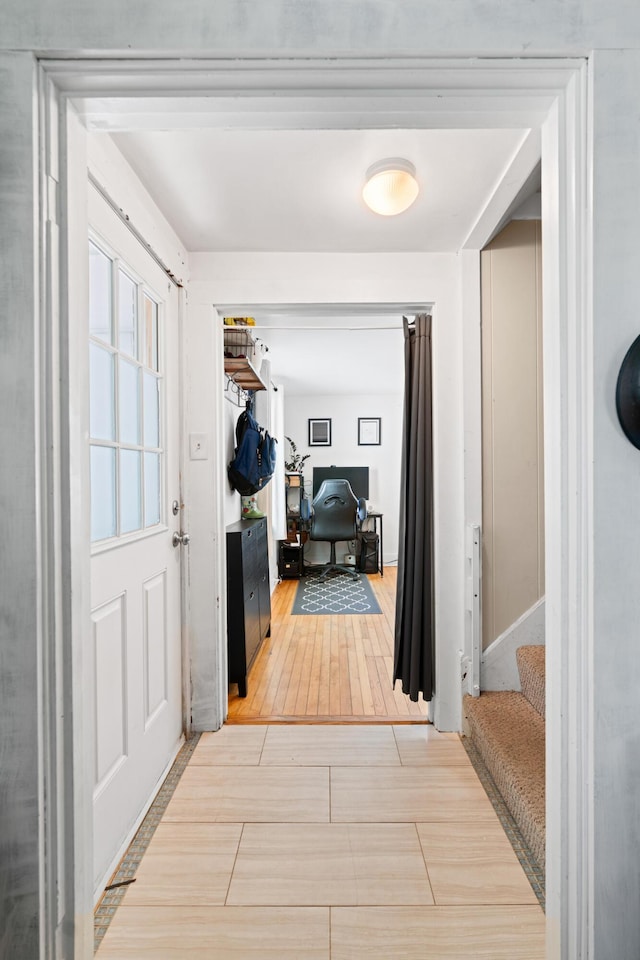46 Meadow Way, Bath, ME 04530 - hallway featuring a desk, stairs, and wood finished floors