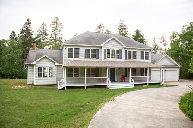106 Sunset Bay Dr, Steuben, ME 04680 - view of front of home featuring a garage, asphalt driveway, a porch, a front lawn, and a chimney