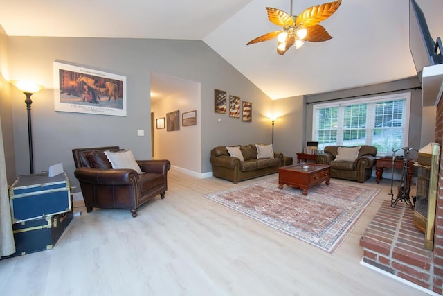 106 Sunset Bay Dr, Steuben, ME 04680 - living room with lofted ceiling, light wood finished floors, and a ceiling fan