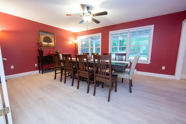 106 Sunset Bay Dr, Steuben, ME 04680 - dining space featuring a ceiling fan and light wood-style flooring