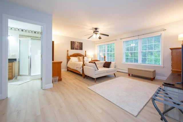106 Sunset Bay Dr, Steuben, ME 04680 - bedroom with light wood-type flooring, baseboard heating, and ceiling fan