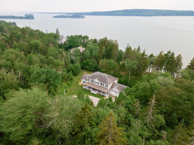 106 Sunset Bay Dr, Steuben, ME 04680 - view from above of property featuring a nearby body of water and a heavily wooded area