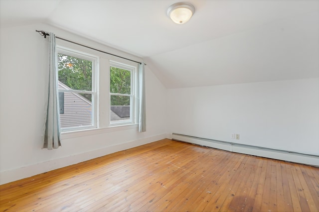 7 Vincent Ave, Biddeford, ME 04005 - additional living space featuring a baseboard radiator, lofted ceiling, and light wood finished floors