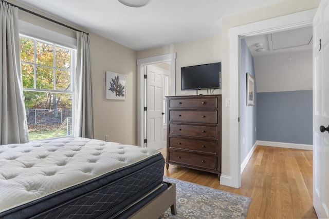 38 Atlantic Ave, Boothbay Harbor, ME 04538 - bedroom with attic access and light wood finished floors