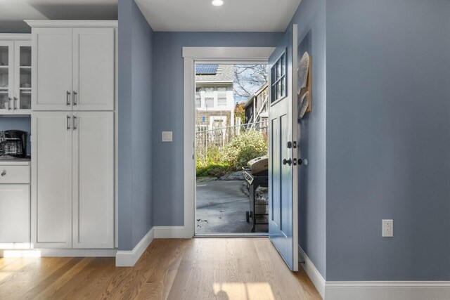 38 Atlantic Ave, Boothbay Harbor, ME 04538 - doorway featuring light wood-style flooring and recessed lighting