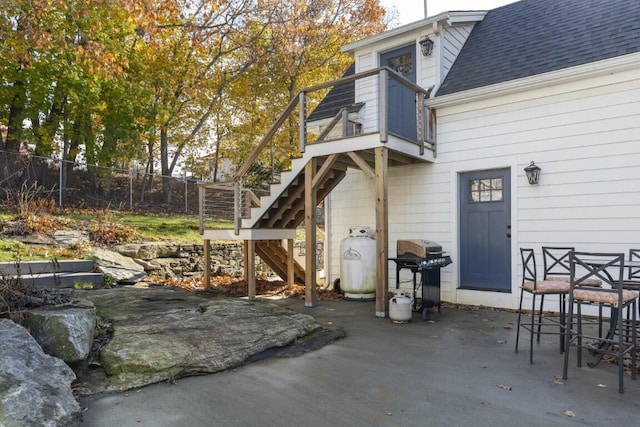 38 Atlantic Ave, Boothbay Harbor, ME 04538 - view of patio featuring area for grilling and stairway