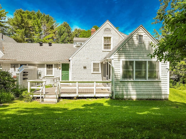 3 Curtis Ave, Camden, ME 04843 - rear view of property with a chimney, a wooden deck, a yard, and roof with shingles