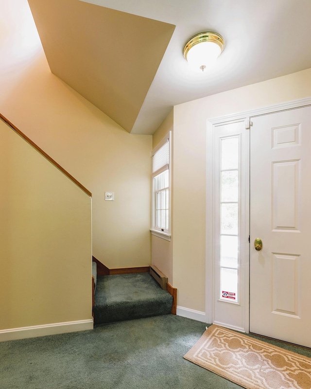 3 Curtis Ave, Camden, ME 04843 - carpeted entryway featuring a baseboard heating unit and stairway