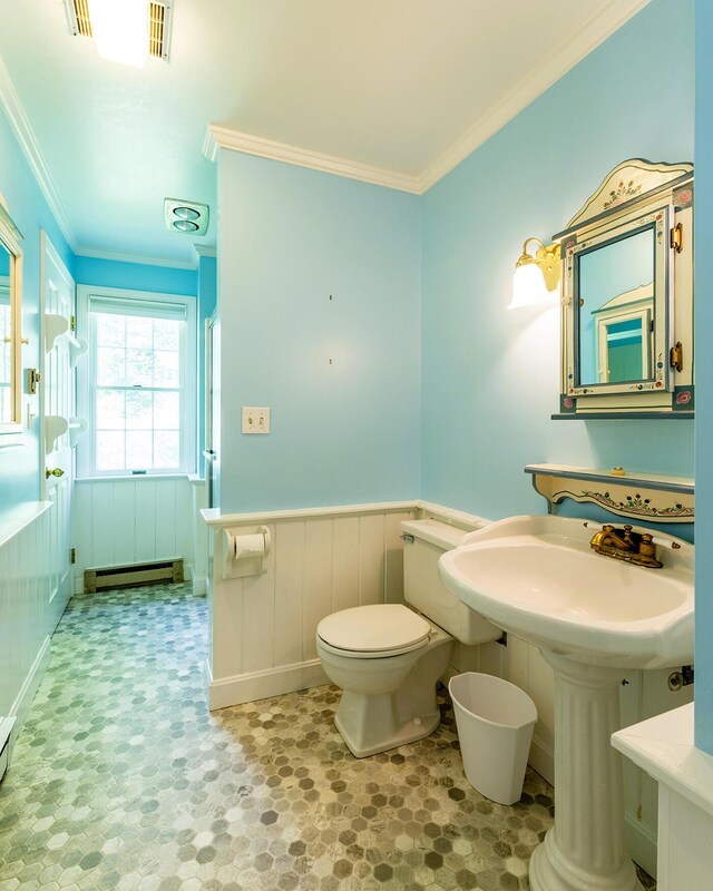 3 Curtis Ave, Camden, ME 04843 - bathroom with a baseboard radiator, wainscoting, crown molding, tile patterned floors, and a baseboard heating unit