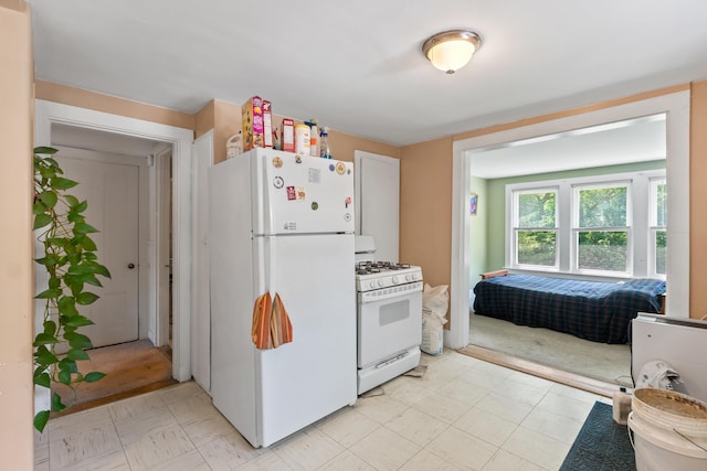 47 Fall Brook St, Portland, ME 04103 - kitchen with white appliances and light flooring