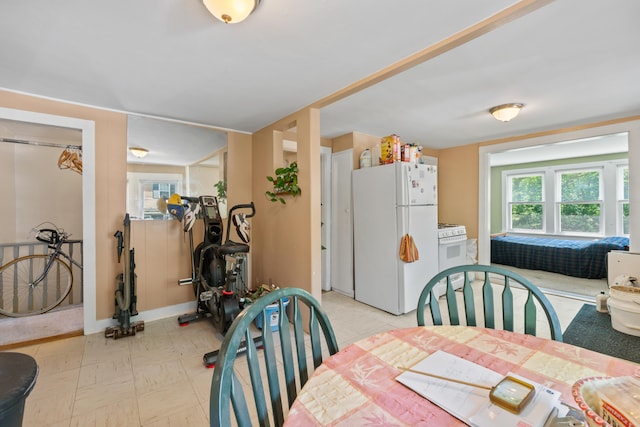 47 Fall Brook St, Portland, ME 04103 - dining space with baseboards and light floors
