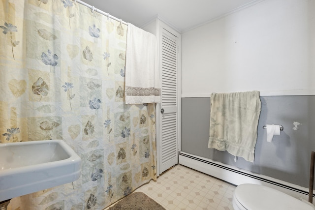 47 Fall Brook St, Portland, ME 04103 - bathroom with a baseboard heating unit, tile patterned floors, and crown molding