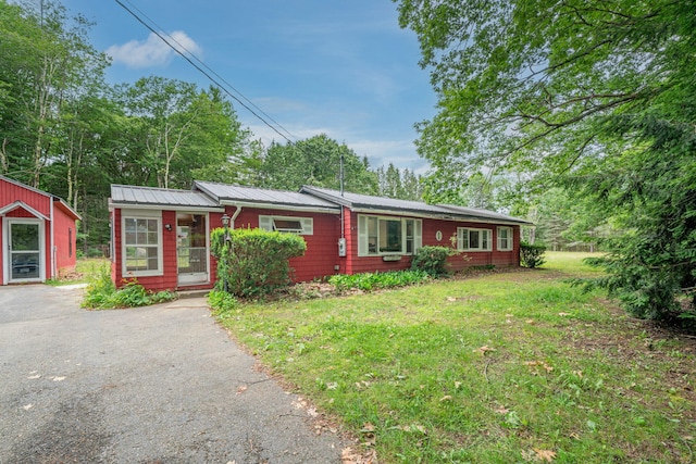 219 Mouse Ln, Alfred, ME 04002 - single story home featuring asphalt driveway, a front yard, and a metal roof