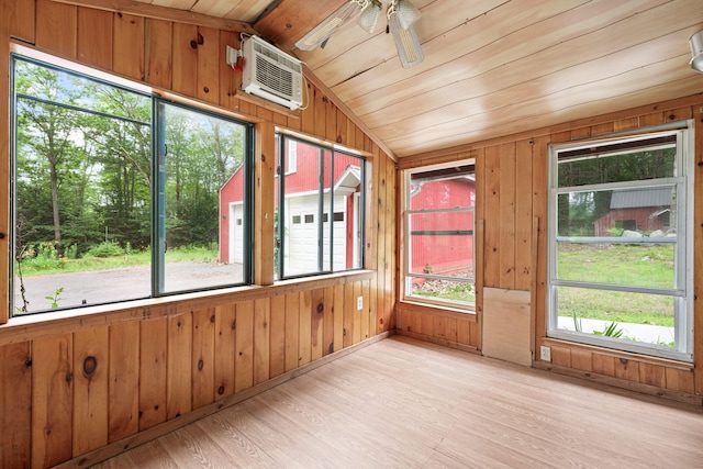 219 Mouse Ln, Alfred, ME 04002 - unfurnished sunroom with wooden ceiling, lofted ceiling, plenty of natural light, wood finished floors, and a wall unit AC
