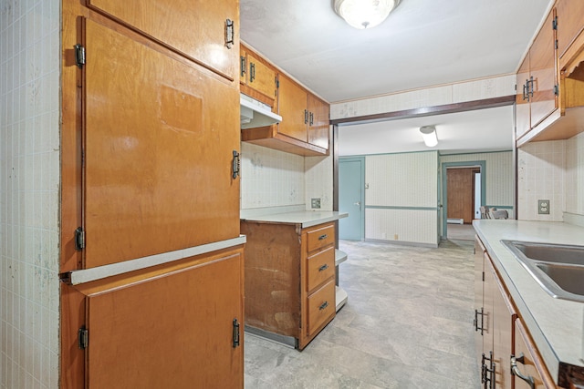 219 Mouse Ln, Alfred, ME 04002 - kitchen featuring brown cabinets and light countertops