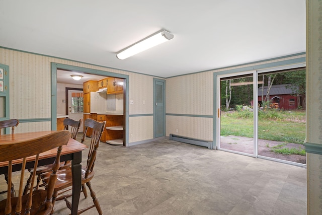 219 Mouse Ln, Alfred, ME 04002 - dining area featuring baseboard heating and wallpapered walls