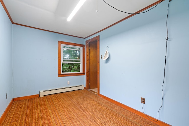 219 Mouse Ln, Alfred, ME 04002 - empty room with a baseboard radiator, crown molding, and carpet floors