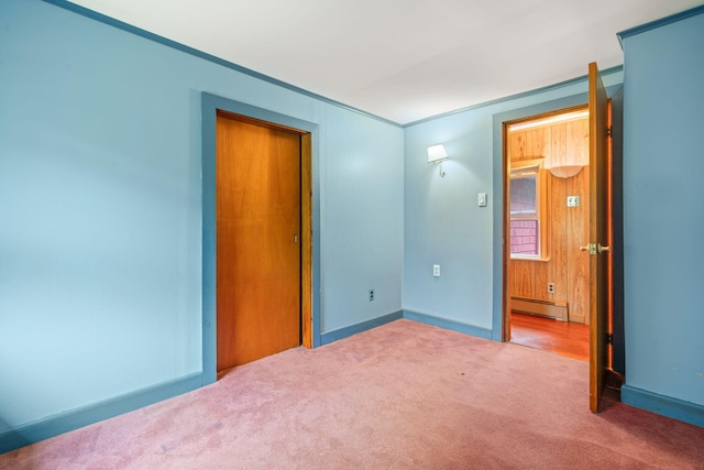 219 Mouse Ln, Alfred, ME 04002 - unfurnished bedroom with a baseboard radiator, carpet floors, and ornamental molding