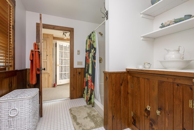 78 Seashore Ave, Portland, ME 04108 - full bathroom with a wainscoted wall, a shower with shower curtain, wood walls, vanity, and tile patterned floors