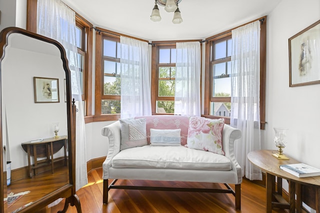 78 Seashore Ave, Portland, ME 04108 - sitting room featuring wood finished floors and a chandelier