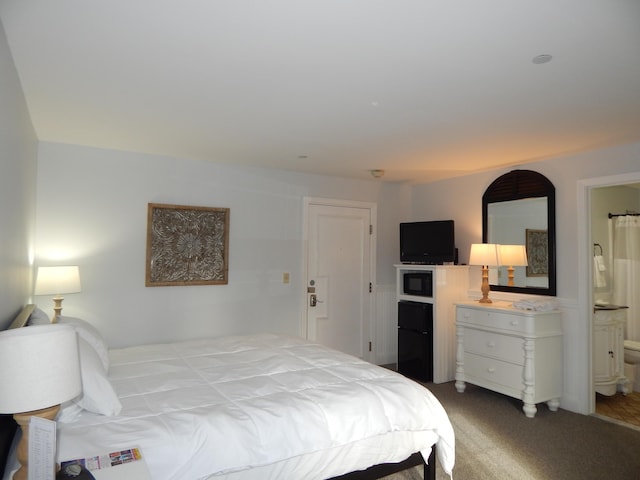 306 Eddy Rd Unit 310, Edgecomb, ME 04556 - bedroom with carpet flooring and ensuite bath