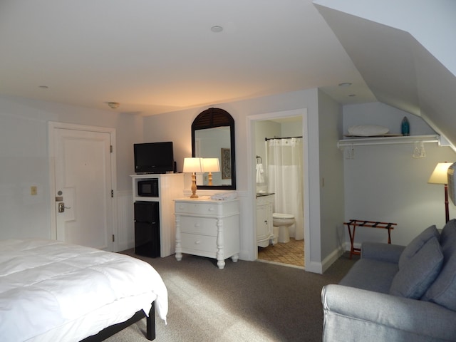 306 Eddy Rd Unit 310, Edgecomb, ME 04556 - carpeted bedroom featuring ensuite bath